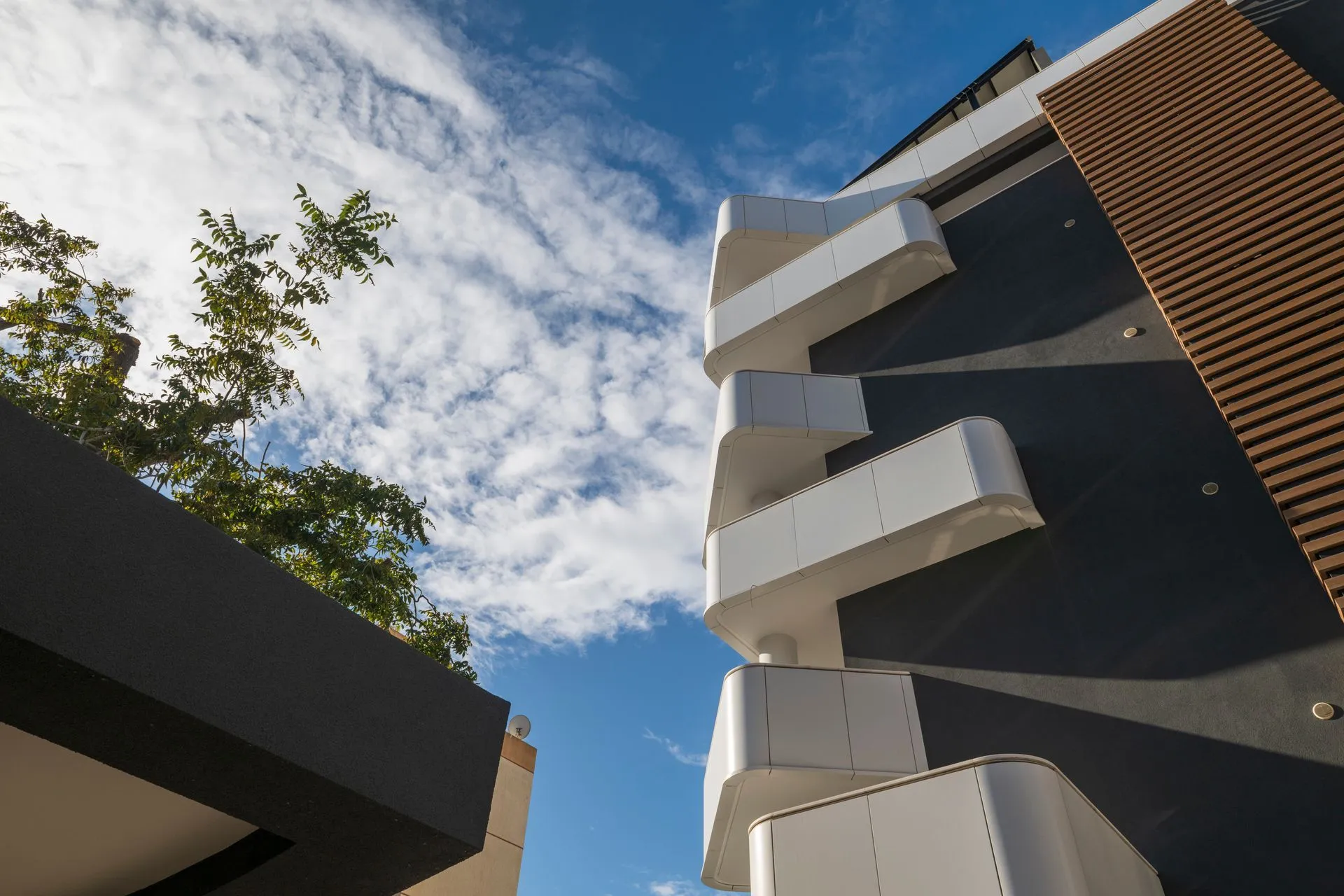 Suite balconies overlooking the property