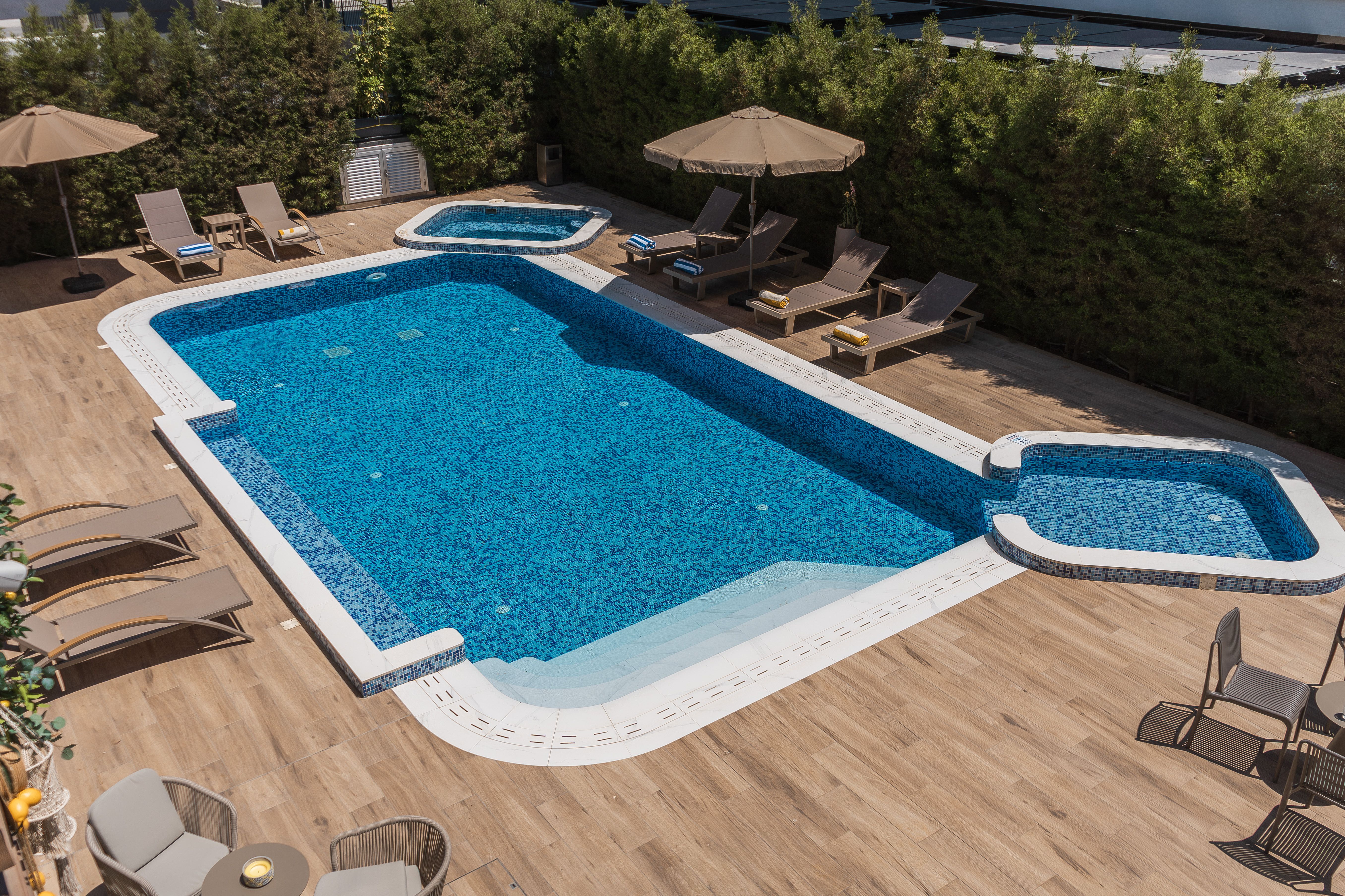 Aerial view of the 26 Suites pool, jacuzzi and sun deck